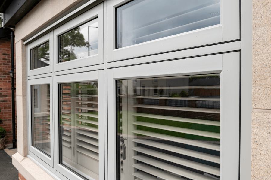 close up grey flush sash window