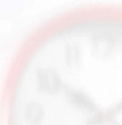 Satin glass sample showing a softly blurred clock behind its uniform frosted finish