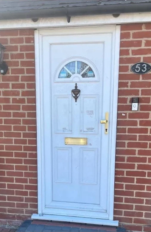 Before installation: worn white uPVC front door at the Hatfield Peverel property
