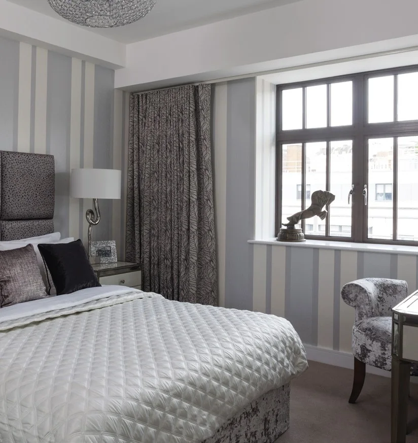 Elegant slim aluminium window framing a light-filled room